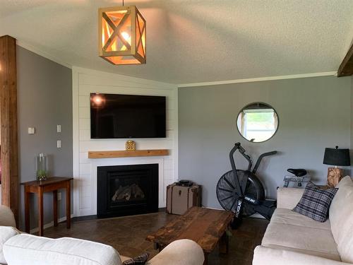 Lot 46,131074 Township Road 590, Rural Woodlands County, AB - Indoor Photo Showing Living Room With Fireplace
