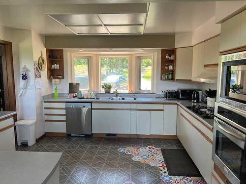 114012 Township Road 592B, Rural Woodlands County, AB - Indoor Photo Showing Kitchen With Double Sink