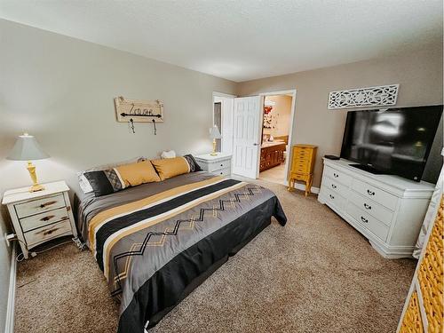 42 Ravine Drive, Whitecourt, AB - Indoor Photo Showing Bedroom