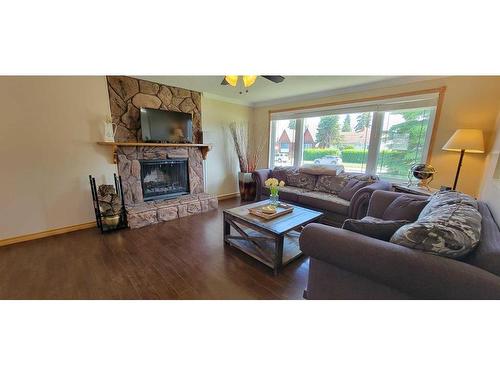 1108 50 Street, Edson, AB - Indoor Photo Showing Living Room With Fireplace