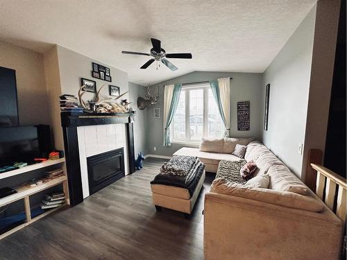 4729 43 Street, Mayerthorpe, AB - Indoor Photo Showing Living Room With Fireplace