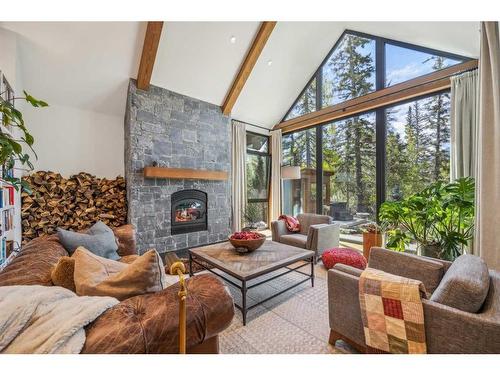 902 16Th Street, Canmore, AB - Indoor Photo Showing Living Room With Fireplace