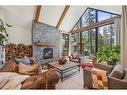 902 16Th Street, Canmore, AB  - Indoor Photo Showing Living Room With Fireplace 