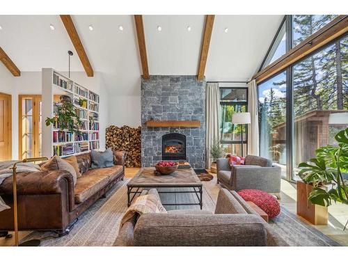 902 16Th Street, Canmore, AB - Indoor Photo Showing Living Room With Fireplace