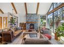 902 16Th Street, Canmore, AB  - Indoor Photo Showing Living Room With Fireplace 