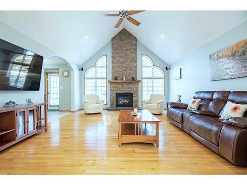 590083 Range Road 114, Rural Woodlands County, AB - Indoor Photo Showing Living Room With Fireplace