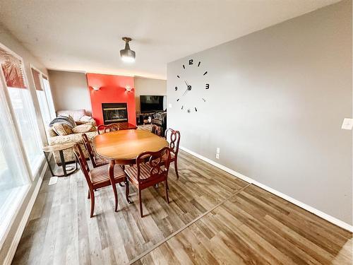 29 Chaisson Crossing, Whitecourt, AB - Indoor Photo Showing Dining Room With Fireplace