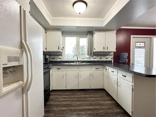 23 Centennial Crescent, Swan Hills, AB - Indoor Photo Showing Kitchen With Double Sink