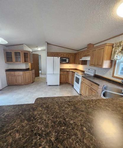 414 10 Street, Fox Creek, AB - Indoor Photo Showing Kitchen With Double Sink