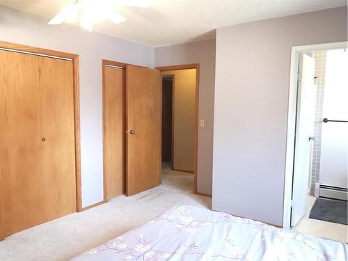 82 Feero Drive, Whitecourt, AB - Indoor Photo Showing Bedroom