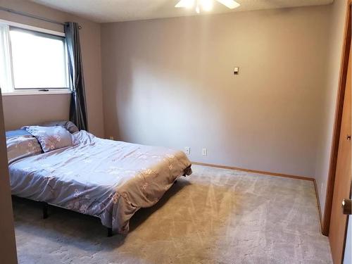 82 Feero Drive, Whitecourt, AB - Indoor Photo Showing Bedroom