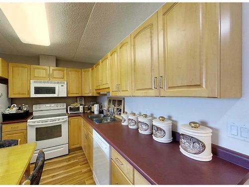 302-777 48 Street, Edson, AB - Indoor Photo Showing Kitchen With Double Sink