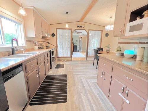 642037 Highway 2, Rural Athabasca County, AB - Indoor Photo Showing Kitchen With Double Sink