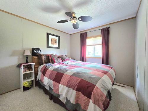 592061A Highway 658, Rural Woodlands County, AB - Indoor Photo Showing Bedroom