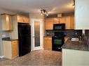 Unit 3-4010 47 Street, Whitecourt, AB  - Indoor Photo Showing Kitchen With Double Sink 