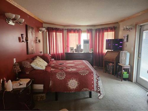 302 8 Avenue, Fox Creek, AB - Indoor Photo Showing Bedroom