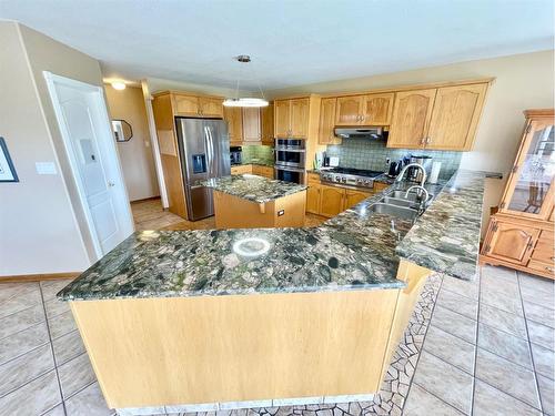 12-49329 Folding Avenue, Rural Yellowhead County, AB - Indoor Photo Showing Kitchen With Stainless Steel Kitchen With Double Sink