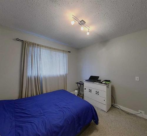 1102 55 Street, Edson, AB - Indoor Photo Showing Bedroom