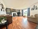 812 9 Avenue, Fox Creek, AB  - Indoor Photo Showing Living Room With Fireplace 