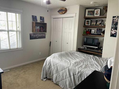 701 10 Street, Fox Creek, AB - Indoor Photo Showing Bedroom