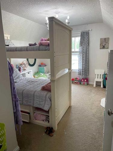 701 10 Street, Fox Creek, AB - Indoor Photo Showing Bedroom