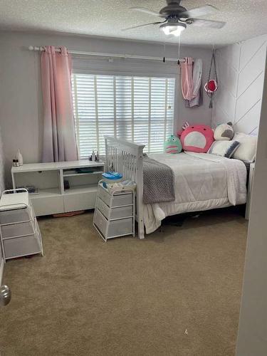 701 10 Street, Fox Creek, AB - Indoor Photo Showing Bedroom