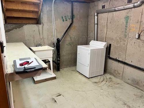 10857 98 Avenue, Grande Cache, AB - Indoor Photo Showing Laundry Room