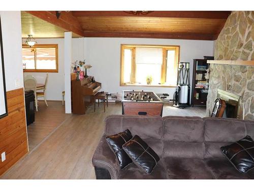 53305 Range Road 111, Rural Yellowhead County, AB - Indoor Photo Showing Living Room With Fireplace