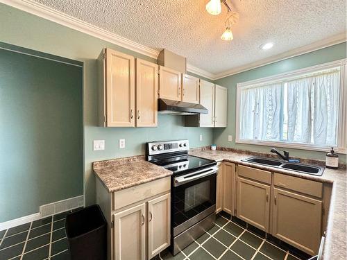 2 Hillside Avenue, Swan Hills, AB - Indoor Photo Showing Kitchen With Double Sink