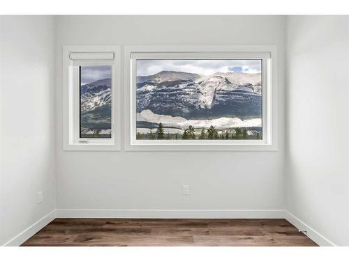 201F-209 Stewart Creek Rise, Canmore, AB - Indoor Photo Showing Other Room