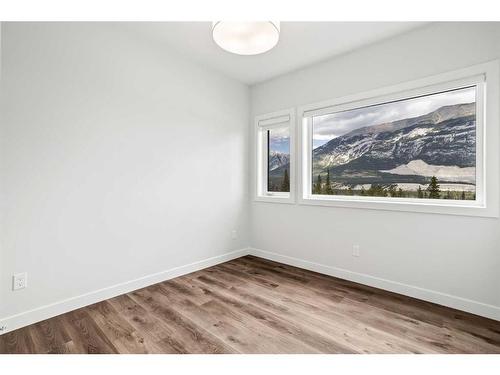 201F-209 Stewart Creek Rise, Canmore, AB - Indoor Photo Showing Other Room