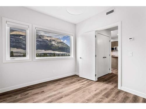 201F-209 Stewart Creek Rise, Canmore, AB - Indoor Photo Showing Other Room