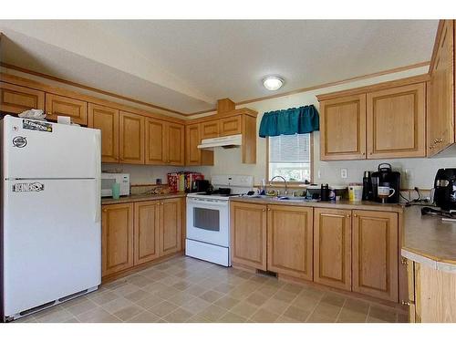 2371 Waskway Drive, Wabasca, AB - Indoor Photo Showing Kitchen With Double Sink