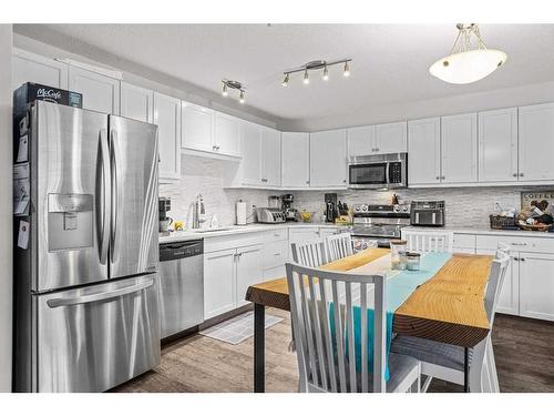 121-300 Palliser Lane, Canmore, AB - Indoor Photo Showing Kitchen With Upgraded Kitchen