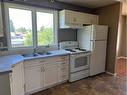 605 7 Ave, Fox Creek, AB  - Indoor Photo Showing Kitchen With Double Sink 