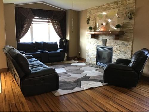 127 Wellwood Drive, Whitecourt, AB - Indoor Photo Showing Living Room With Fireplace