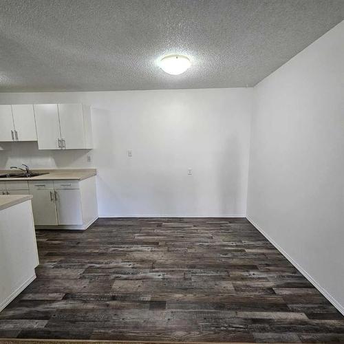 104A-5611 10 Avenue, Edson, AB - Indoor Photo Showing Kitchen With Double Sink