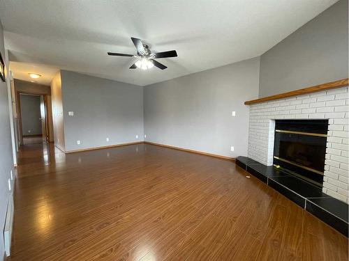 107 Assiniboine Drive, Swan Hills, AB - Indoor With Fireplace