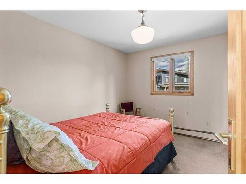 1102 10Th Avenue, Canmore, AB - Indoor Photo Showing Bedroom