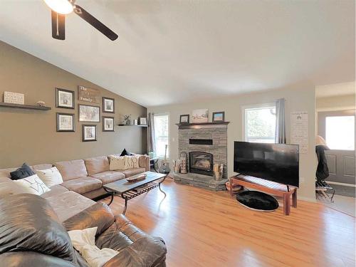 644081 Range Road 235, Rural Athabasca County, AB - Indoor Photo Showing Living Room With Fireplace