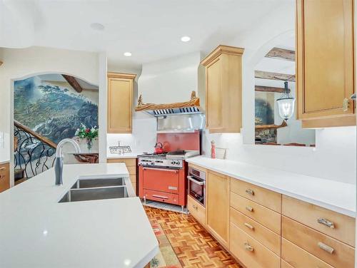 Creekside - 1-701 Mallard Alley, Canmore, AB - Indoor Photo Showing Kitchen With Double Sink