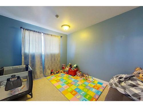 320 5 Street Ne, Slave Lake, AB - Indoor Photo Showing Bedroom