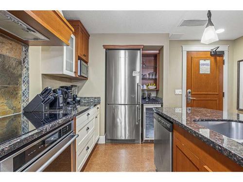 305-191 Kananaskis Way, Canmore, AB - Indoor Photo Showing Kitchen With Stainless Steel Kitchen With Upgraded Kitchen