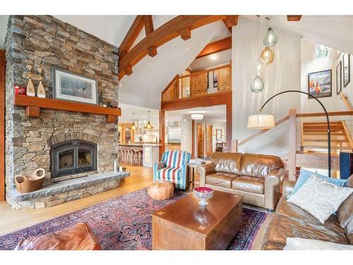 517 4Th Street, Canmore, AB - Indoor Photo Showing Living Room With Fireplace