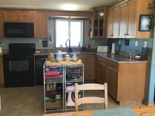 26 Gunderson Drive, Whitecourt, AB - Indoor Photo Showing Kitchen With Double Sink