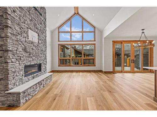 1308 Three Sisters Parkway, Canmore, AB - Indoor Photo Showing Living Room With Fireplace