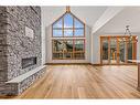 1308 Three Sisters Parkway, Canmore, AB  - Indoor Photo Showing Living Room With Fireplace 