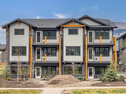 1308 Three Sisters Parkway, Canmore, AB - Outdoor With Balcony With Facade