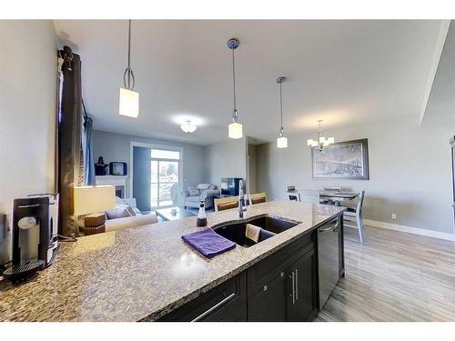 104-605 6 Avenue Se, Slave Lake, AB - Indoor Photo Showing Kitchen With Double Sink With Upgraded Kitchen