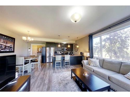 104-605 6 Avenue Se, Slave Lake, AB - Indoor Photo Showing Living Room